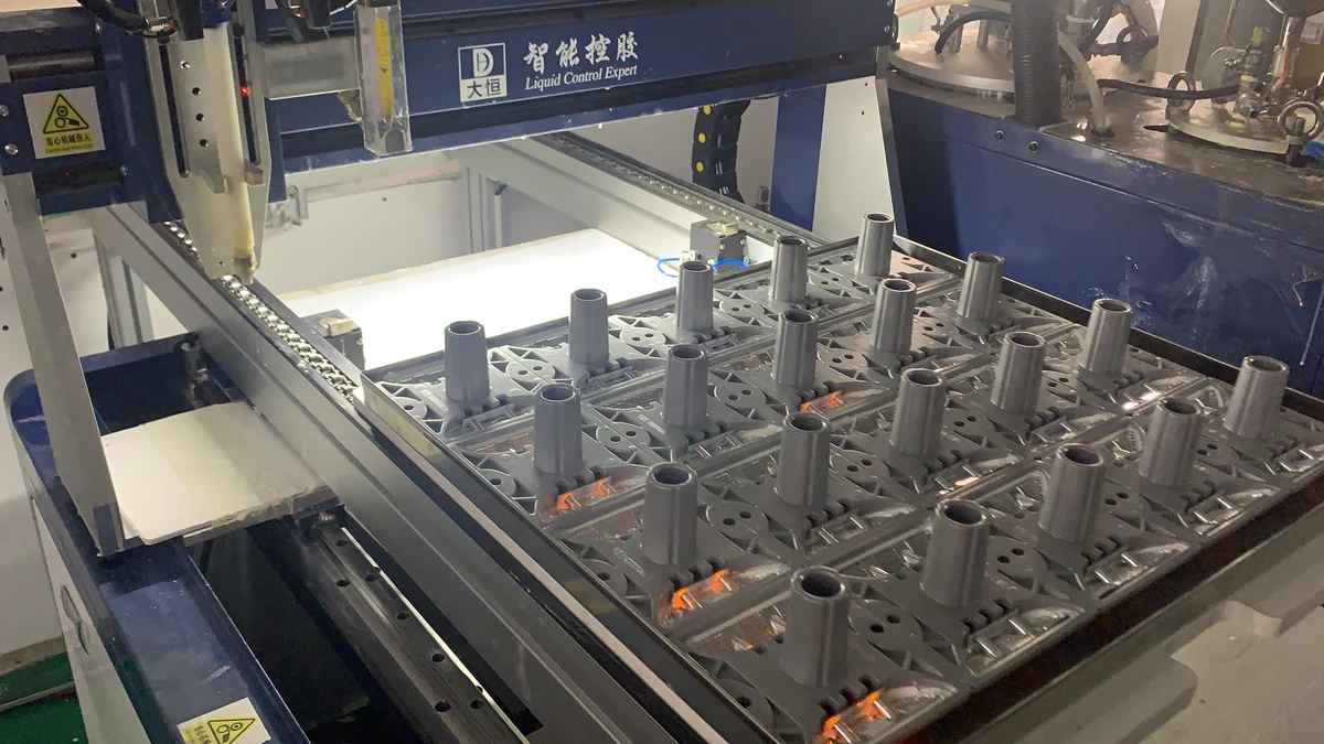 Road stud housings positioned beneath dispensing equipment