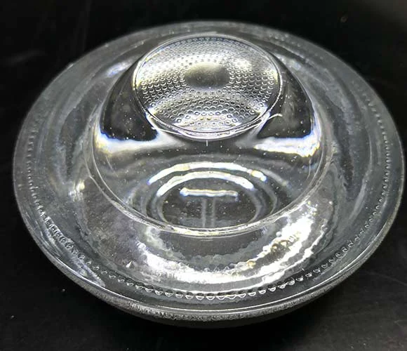 Transparent domed glass road stud from the supplied product photographs